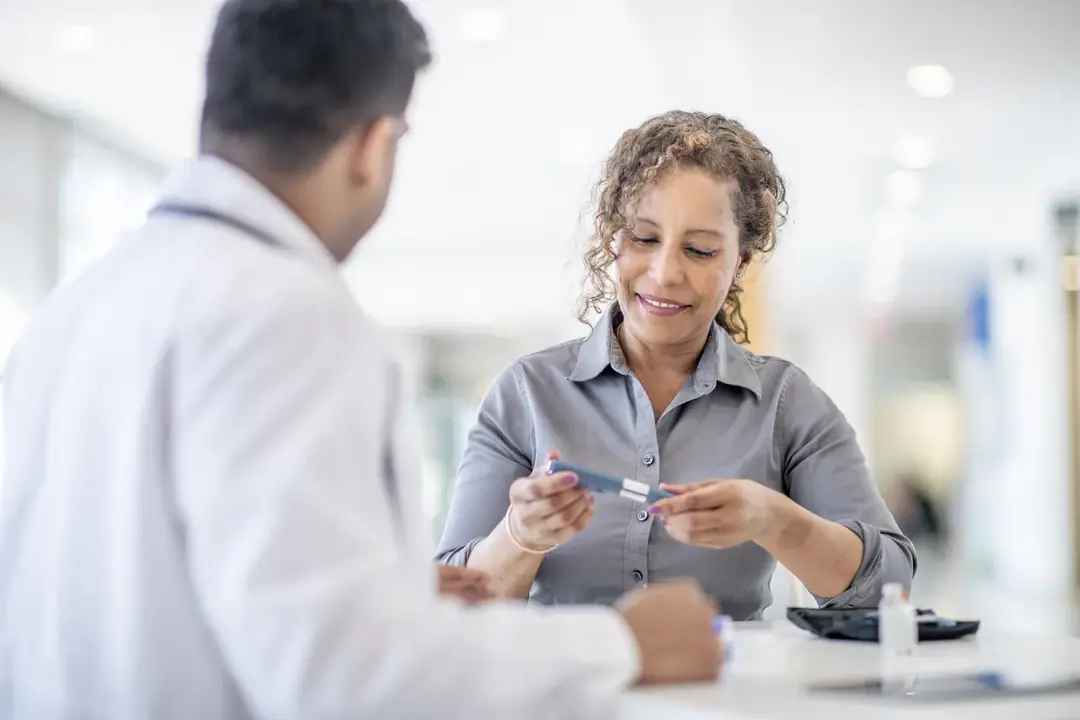 Patient consulting with doctor about diabetes management