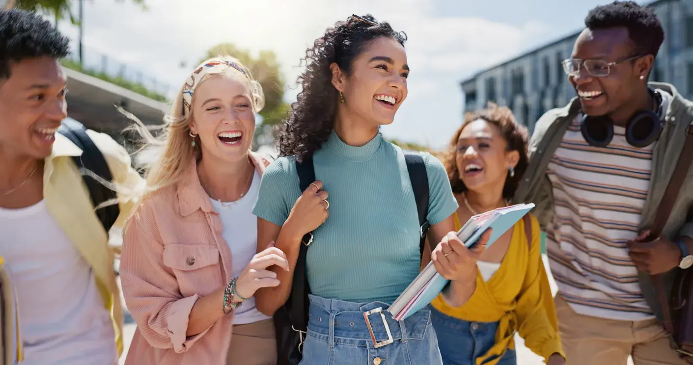 A group of happy students together on campus